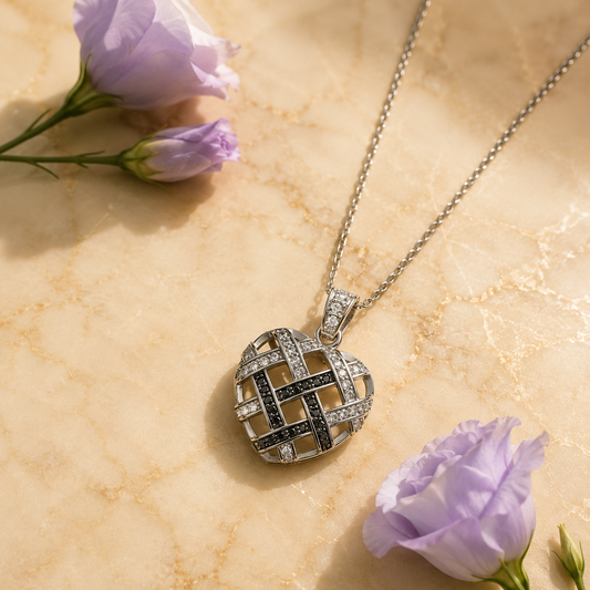 Black and white woven cubic zirconia heart pendant with purple flowers