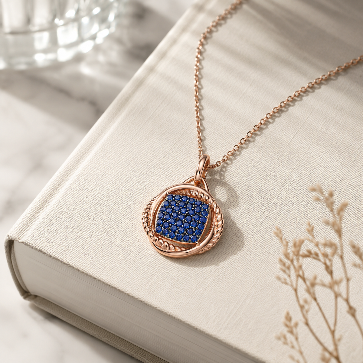 Rose gold and blue cubic zirconia drop pendant necklace